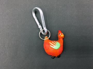 Schlüsselanhänger Kautschuk Hühner orange Kringel  