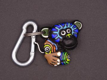 Schlüsselanhänger Kautschuk Affe schwarz Regenbogen  